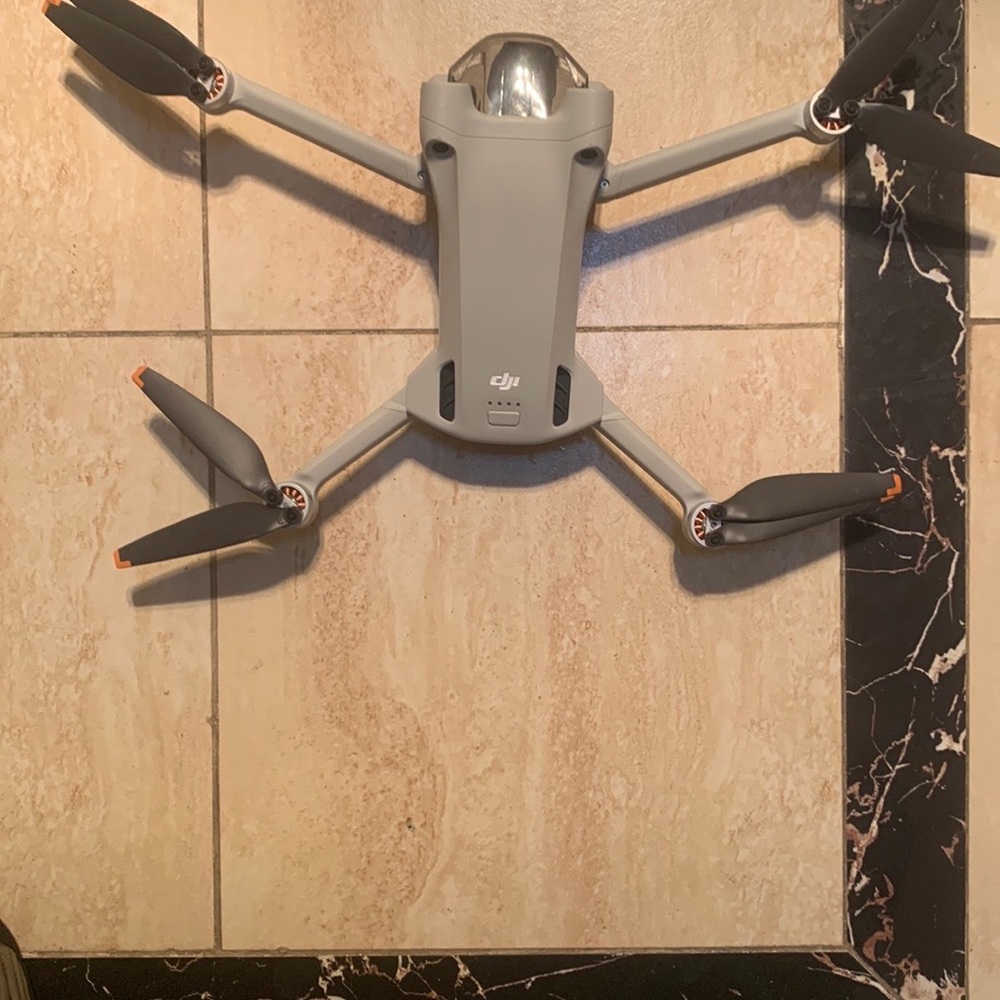 DJI Drone in Gray with Orange Tips
